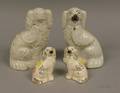 Four English Staffordshire Seated Spaniels