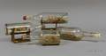 Four Folk Art Sailing Ships in Bottles