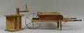 Childs Redpainted Wooden Wheelbarrow and a Mustardpainted Wooden Crank Grinder