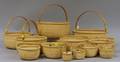 Set of Twelve Nesting Modern Woven Nantucketstyle Baskets with Swing Handles