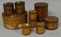 Nine Circular Covered Wooden Kitchen Boxes and Canisters