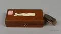 Carved Mahogany Whale Stamp and a Small Ivory Inlaid Mahogany Game Board Box