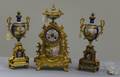 Threepiece French Gilt and Enameled Clock Garniture