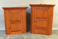 Two custom made cherry hanging corner cupboards