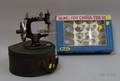 SixteenPiece Childs Tea Set and a Singer Childs Sewing Machine