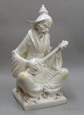 Large Blanc de Chine Porcelain Statue of a Musician