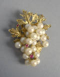 14K yellow gold pearl and ruby brooch with 23 pearls