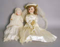 Porcelain doll by Grace Putnam together with a German doll stamped Special 65