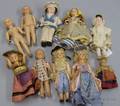 Nine Assorted Small Composition Dolls