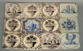 Twelve delft tiles