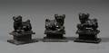 Three Soapstone Foo Dogs on Pedestals
