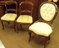 Pair of Victorian Rococo Revival Upholstered Carved Walnut Parlor Side Chairs and a Single Parlor Side ChairD