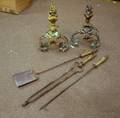 Pair of French Rococostyle Gilt Bronze Urn and Flame Chenets with a Set of Three Brass Fireplace Tools