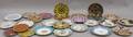 Twentyseven Mostly Handpainted Decorated Porcelain Plates