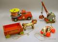 Buddy L MerryGoRound Truck a German Digger and Two FisherPrice Toys