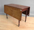 New England red stained dropleaf table