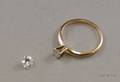 14kt Gold and Diamond Solitaire and an Unmounted Roundcut Diamond