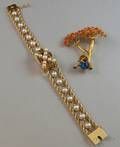 Ladys 14kt Gold Pearl and Sapphire Covered Wristwatch and a 14kt Gold Carnelian and Enamel Figural Brooch