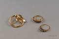 Two 14kt Gold and Diamond Rings and a 14kt Gold Pearl and Diamond Ribbon Festooned Circle Brooch