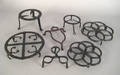 Seven Pennsylvania wrought iron and cast iron trivets early 19th c