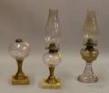 Three Colorless Molded and Blown Glass Oil Lamps