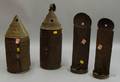 Two Pierced Tin Candle Lanterns and a Near Pair of Pressed Tin Candle Wall Sconces