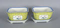 Pair of Chinese export porcelain yellow ground planters and undertrays