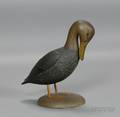 Carved and Painted Preening Black Duck Figure