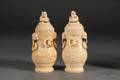 Pair of Ivory Covered Jars