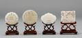 Four Carved and Pierced Jade Plaques