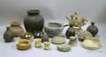 Approximately Twenty Glazed and Unglazed Pottery Vessels and a Figure