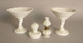 Four pieces of milk glass