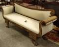 Classical Upholstered Brassmounted Carved Mahogany and Mahogany Veneer Sofa with Paw Feet