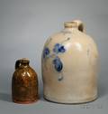 Norton  Fenton East Bennington Vt Cobalt Floral Decorated ThreeGallon Stoneware Jug and a Mottled Glazed Redware Jug