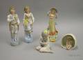 Four Bisque Figures and a Royal Copenhagen Porcelain Seated Figure