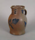 Pennsylvania blue decorated stoneware pitcher 19th c