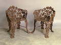 Pair of cast iron garden seats