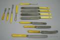 Eight BoneHandled Knives and Five Bone Serving Flatware Items