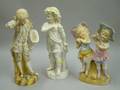 Three Bisque Figures and Figural Groups
