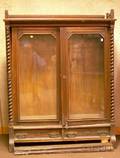Late Victorian Carved Oak TwoDoor Bookcase over Two Drawers