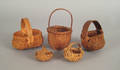 Group of five miniature splint oak baskets 19th c
