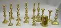 Six Pairs of Brass Candlesticks a Brass Fire Starter Can and Two Single Brass Candlesticks