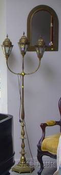 Pierced Brass ThreeLight Floor Lamp and a Brass Framed Mirror