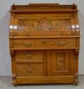 Victorian Eastlaketype Carved Walnut and Burl Veneer Cylindertop Desk