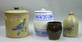 Three Pieces of Decorated and Glazed Stoneware and a Large German Blue and White Floral Decorated Jar with Cover