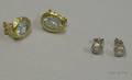 Pair of 18kt Gold and Aquamarine Earclips and a Pair of 14kt White Gold and Diamond Studs