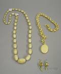 Ivory Beaded Necklace an Ivory Chain and Locket and a Pair of Ivory Earrings