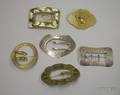 Six Assorted Art Nouveau and Art Nouveau Style Buckle Brooches