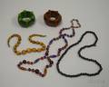 Two Bakelite Bracelets a Black Jet Beaded Necklace and Amber Necklace and a Purple and Orange Glass Beaded N