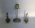 Two reproduction betty lamps